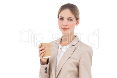 Stylish businesswoman with coffee cup