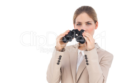 Businesswoman with binoculars