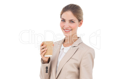 Smiling businesswoman with coffee cup