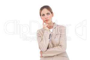 Thinking businesswoman looking away