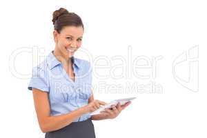 Smiling businesswoman with digital tablet