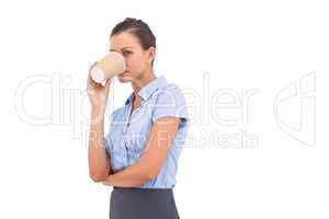 Businesswoman drinking cup of coffee