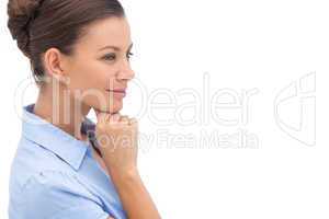 Thinking businesswoman with hand on chin