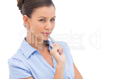 Serious businesswoman with pen Serious businesswoman with pen