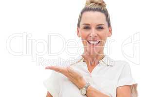 Businesswoman presenting something with palm