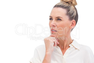 Confused businesswoman looking away