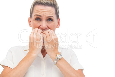 Anxious businessman biting nails
