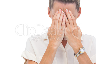 businesswoman covering her face