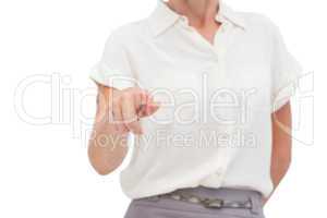 Businesswoman indicating something with finger