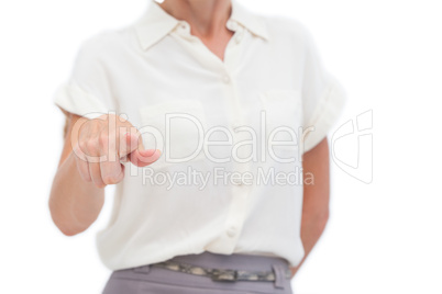 Businesswoman indicating something with hand