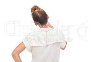 Businesswoman relieving neck ache
