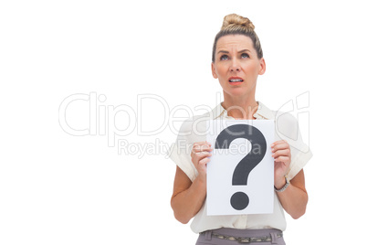 Confused businesswoman with question mark