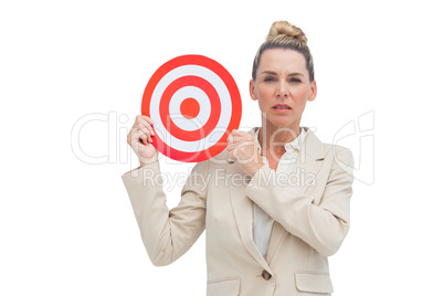 Businesswoman holding target