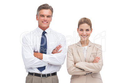 Mature businessman standing with his coworker