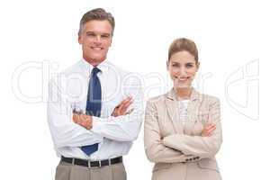 Mature businessman standing with his coworker