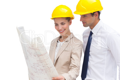 Architect team looking at construction plan