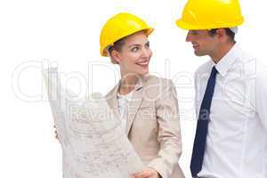 Architect team looking at each other with construction plan