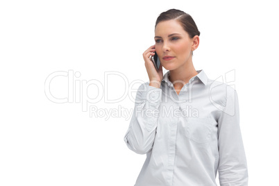 Serious businesswoman with cellphone