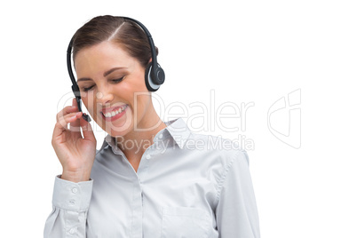 Laughing businesswoman with headset