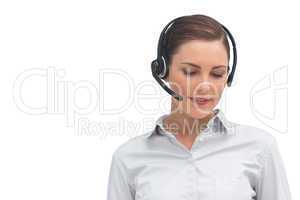 Smiling call centre agent wearing headset