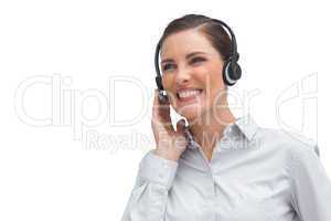 Laughing call centre agent wearing headset