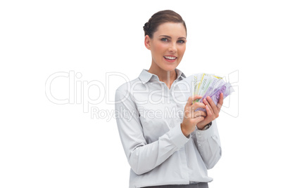 Businesswoman showing lots of money