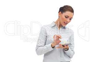 Businesswoman counting money