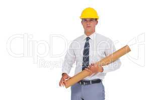 Architect holding a rolled up blueprint