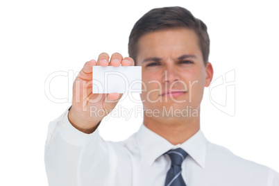 Businessman showing a white blank business card