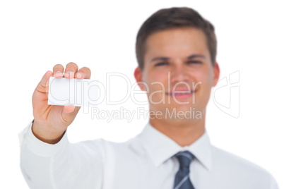 Businessman showing a blank business card