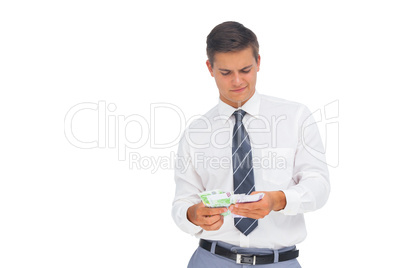 Businessman counting cash