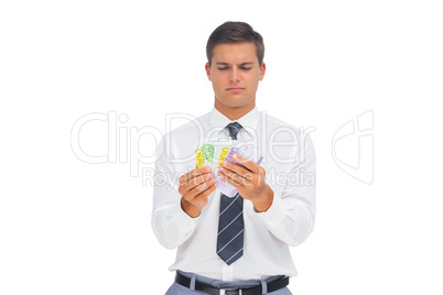 Businessman counting money