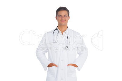 Doctor smiling with hands in pocket