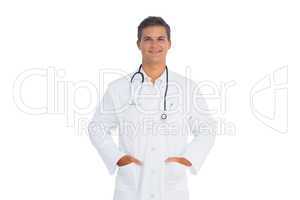 Doctor smiling with hands in pocket