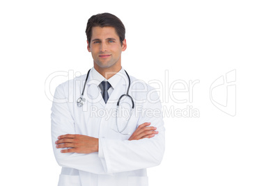 Attractive doctor smiling with arms crossed Attractive doctor smiling with arms crossed