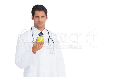 Doctor holding an apple