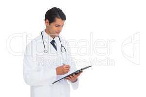 Smiling doctor holding pen and clipboard