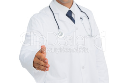 Doctor reaching out for a handshake