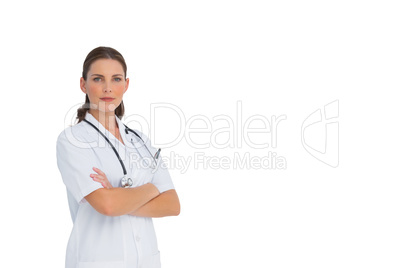 Stern nurse with arms crossed