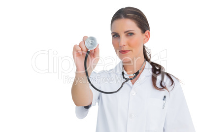 Nurse holding up her stethoscope