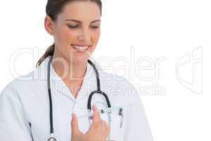 Happy nurse holding a syringe