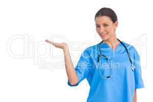 Surgeon holding up hand in presentation