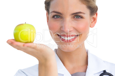 Nurse with apple in her hand