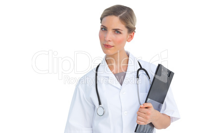 Serious nurse holding clipboard Serious nurse holding clipboard