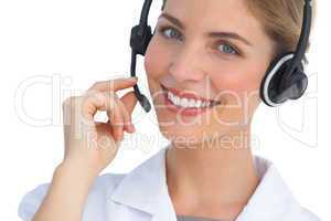 Happy nurse working with headset