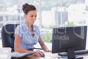 Businesswoman working on her computer