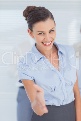 Business woman giving her hand for handshake