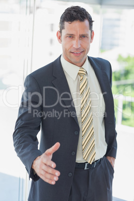 Businessman offfering hand for handshake