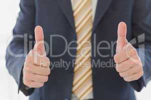 Businessman thumbs up