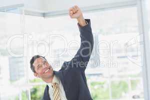 Businessman raising up his hand